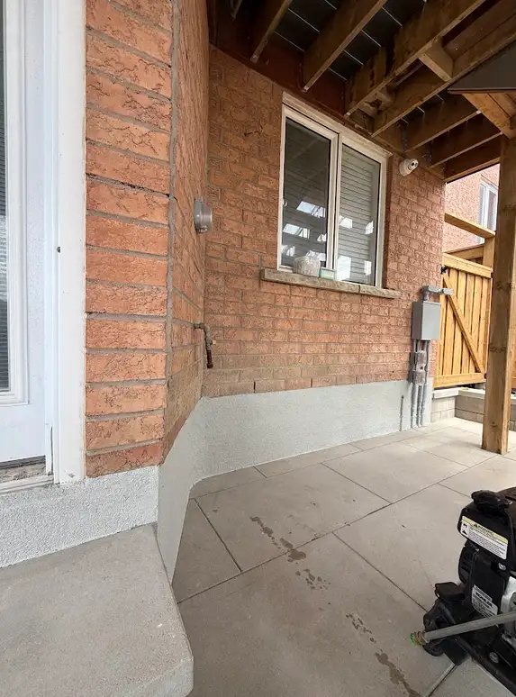 Exterior parging and waterproofing